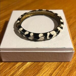 Gold plated black & white enamel hinged bangle bracelet